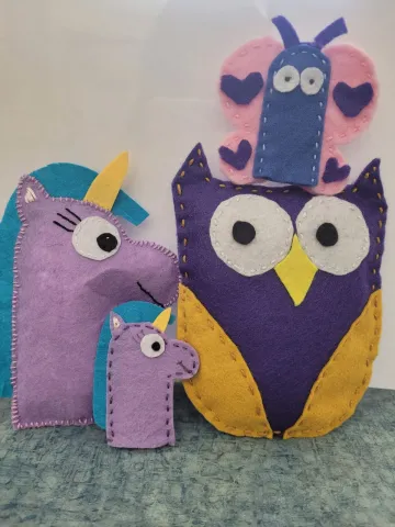 Four felt friends (purple unicorn stuffie, purple unicorn finger puppet, purple & gold owl stuffie, pink & blue butterfly finger puppet)