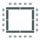 Tables forming a square with chairs surrounding the outer perimeter of the tables. The middle is an open space.